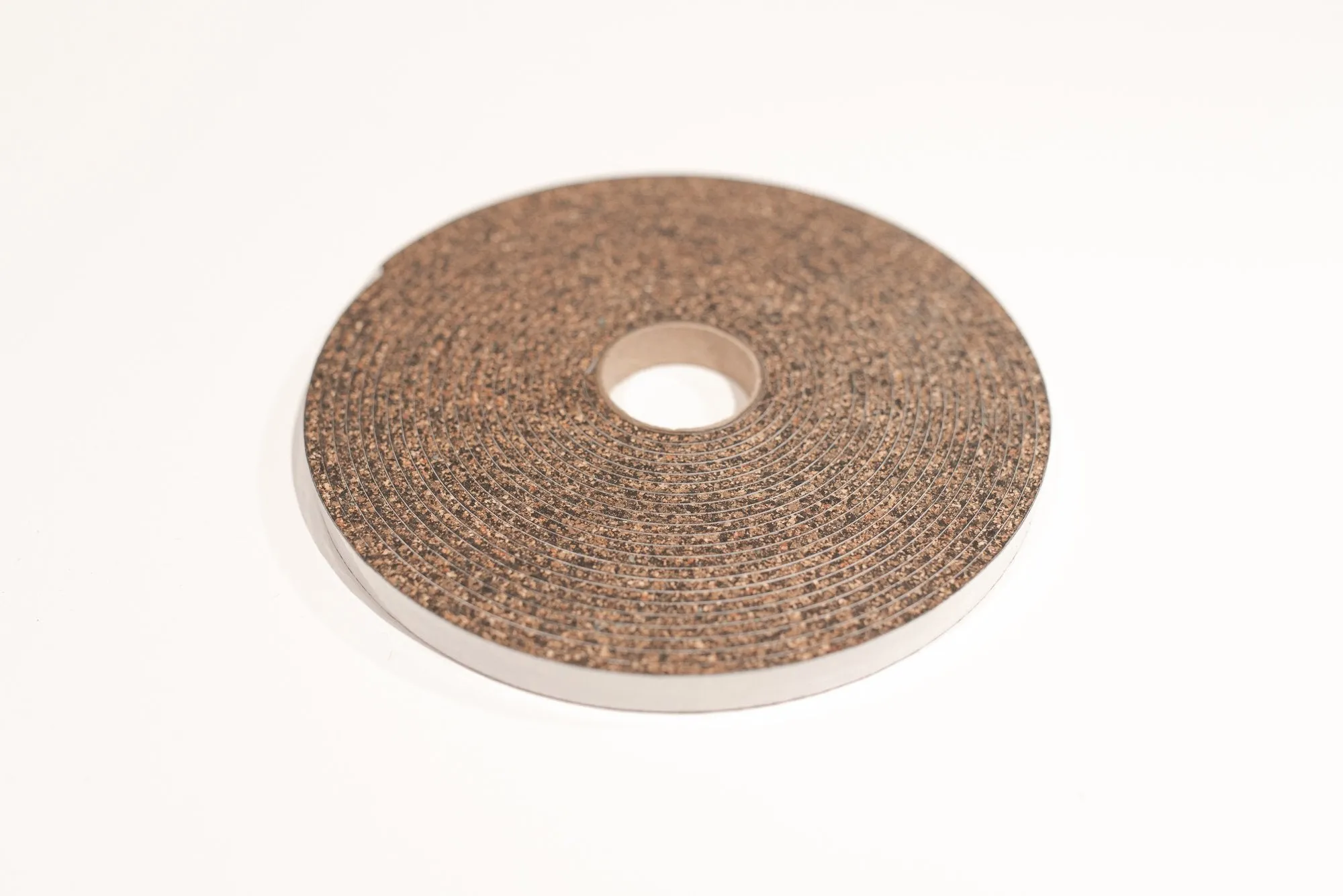 REDI-GUARD Tm CORK RUBBER STRIPPING WITH ADHESIVE (SINGLES)